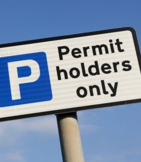 A parking permit sign