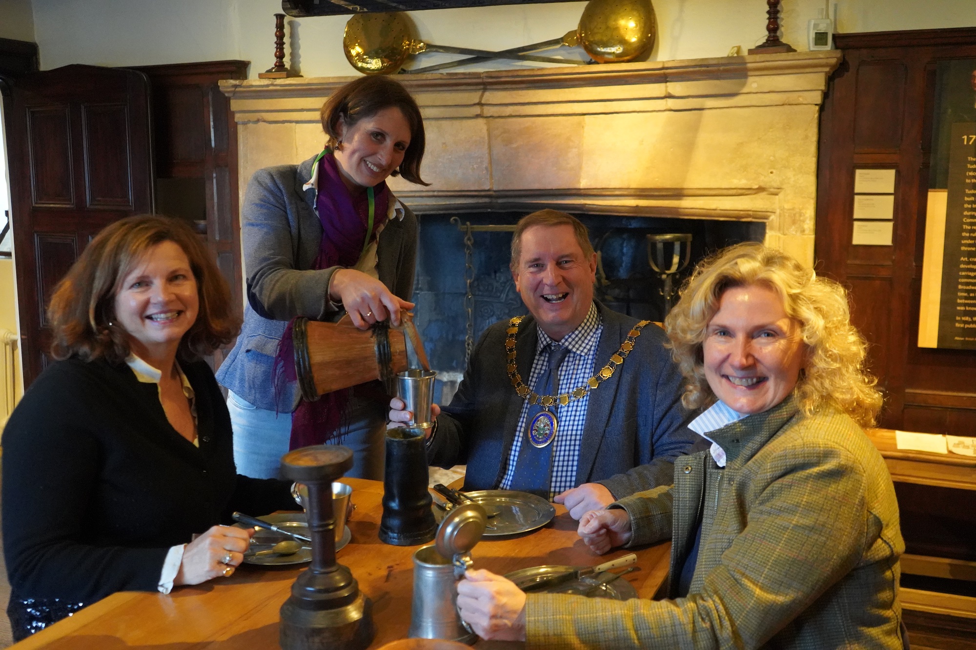 Anona van Lawick, Broadway Museum Director, serves Cllr Robert Raphael, Chairman of Wychavon District Council, Cllr Emma Sims (left) and Cllr Emma Kearsey (right) who both represent Broadway, Sedgeberrow and Childswickham on Wychavon District Council.